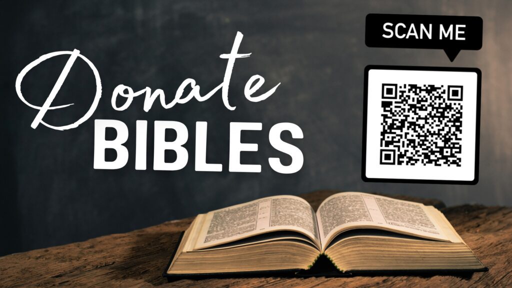open bible with QR code to donate
